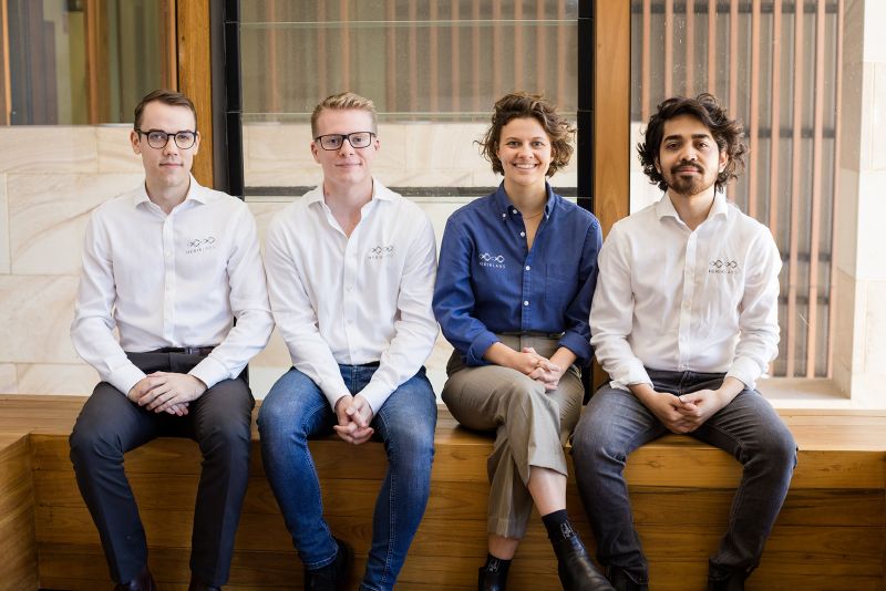 Herik Labs team members seated in a row